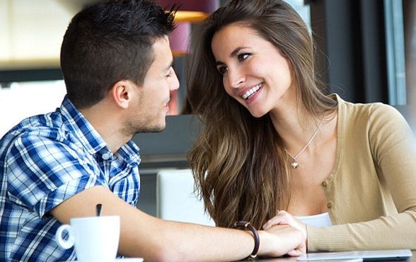 Young couple in love at a coffee shop